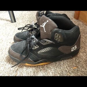 Brown and black Jordans